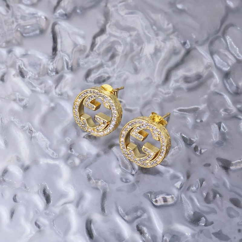 G*u*i earrings